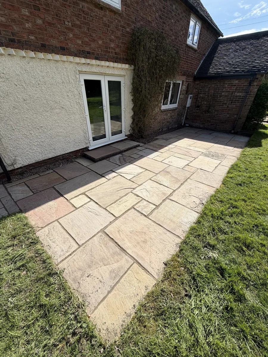 Restored patio surface after maintenance work by GEM Landscaping