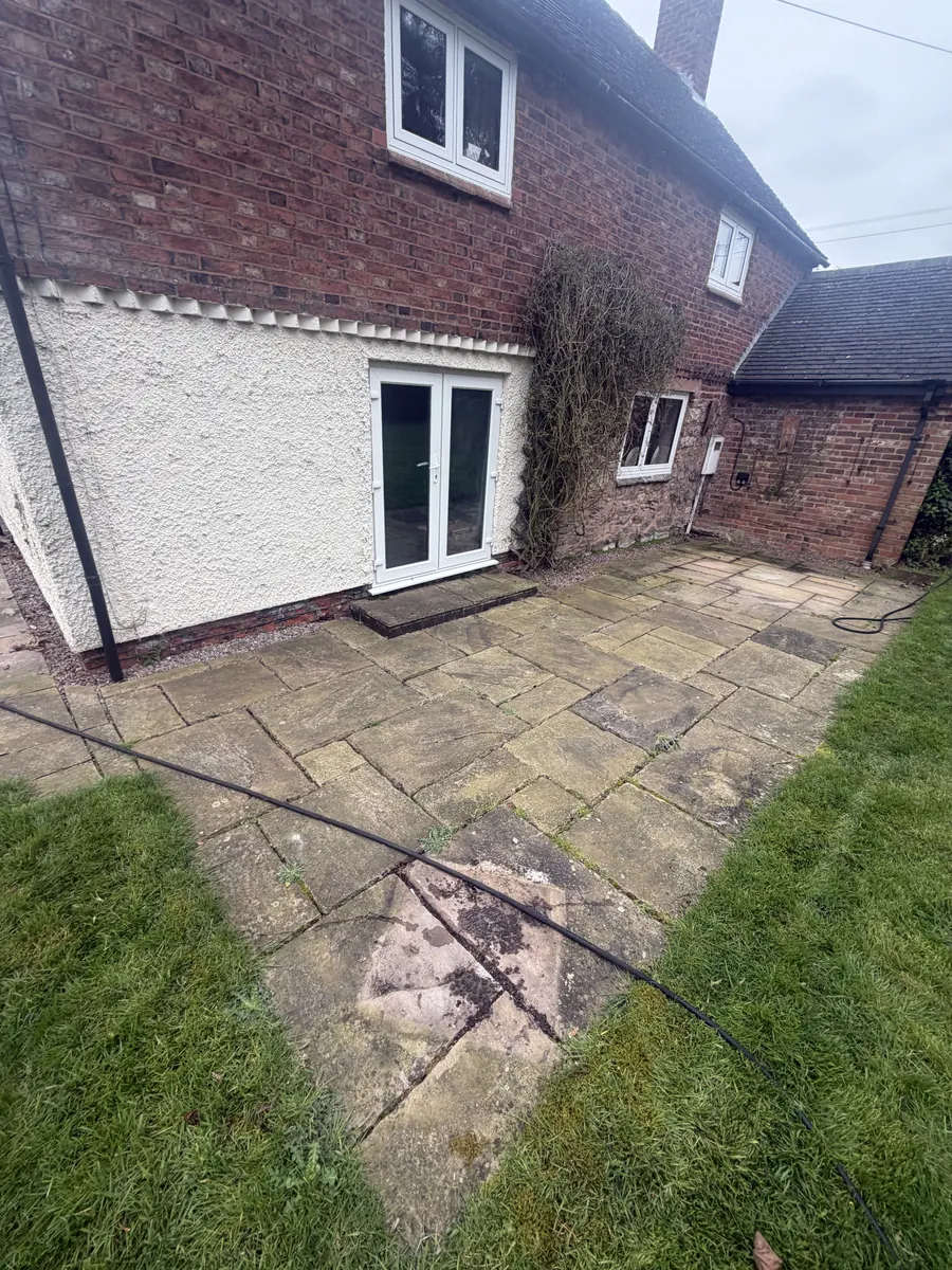 Patio before jet-wash restoration by GEM Landscaping